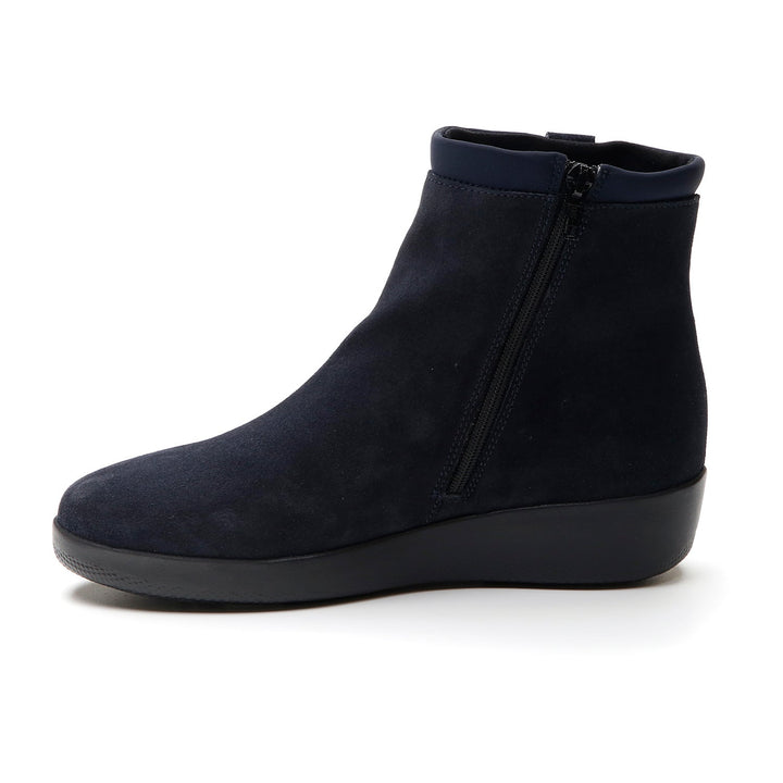 Navy Chelsea ankle boot with elastic side panels and low wedge sole