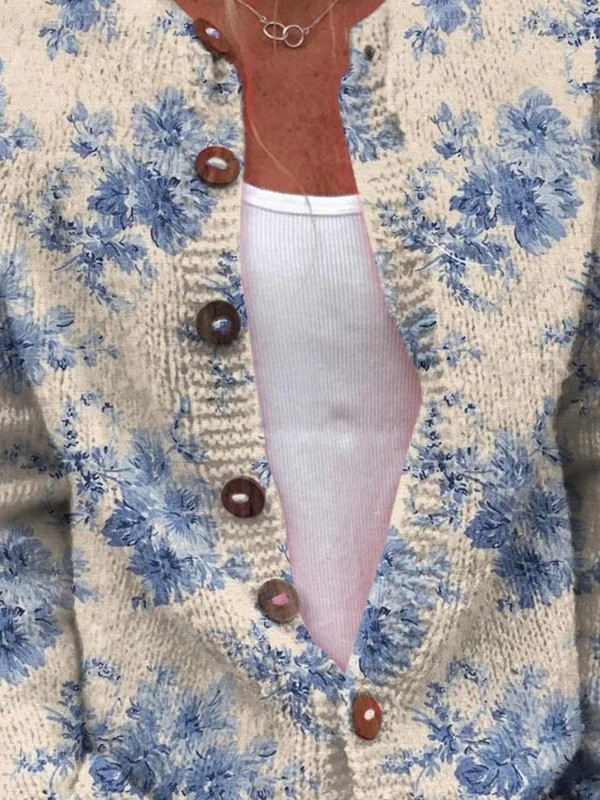 Women's cream cardigan with blue floral print and front buttons
