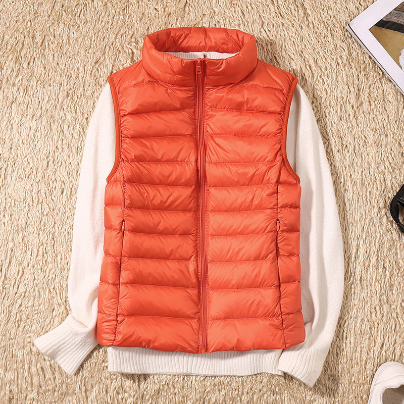 Women's quilted puffer vest with high collar and zipper