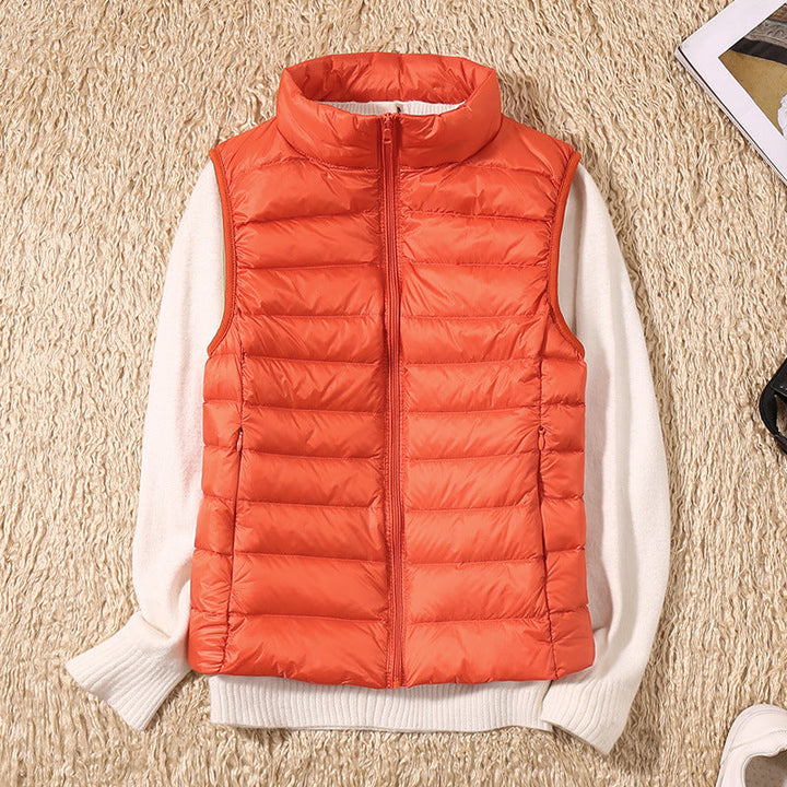 Women's quilted puffer vest with high collar and zipper