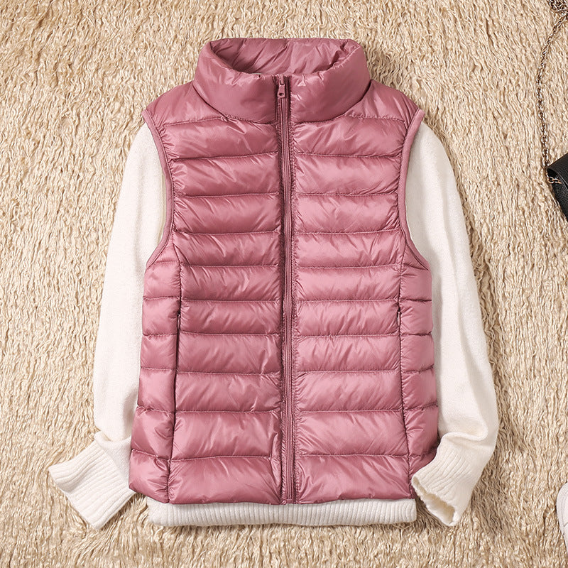 Women's quilted puffer vest with high collar and zipper