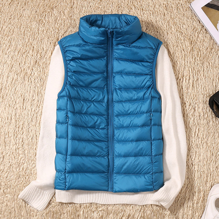 Women's quilted puffer vest with high collar and zipper