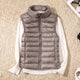 Women's quilted puffer vest with high collar and zipper