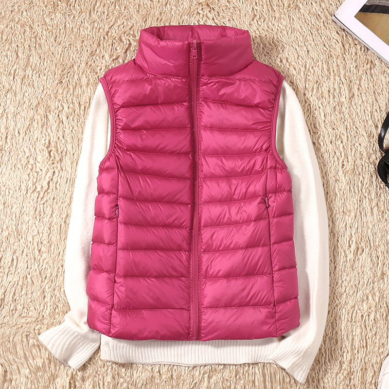 Women's quilted puffer vest with high collar and zipper