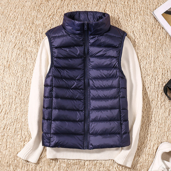 Women's quilted puffer vest with high collar and zipper