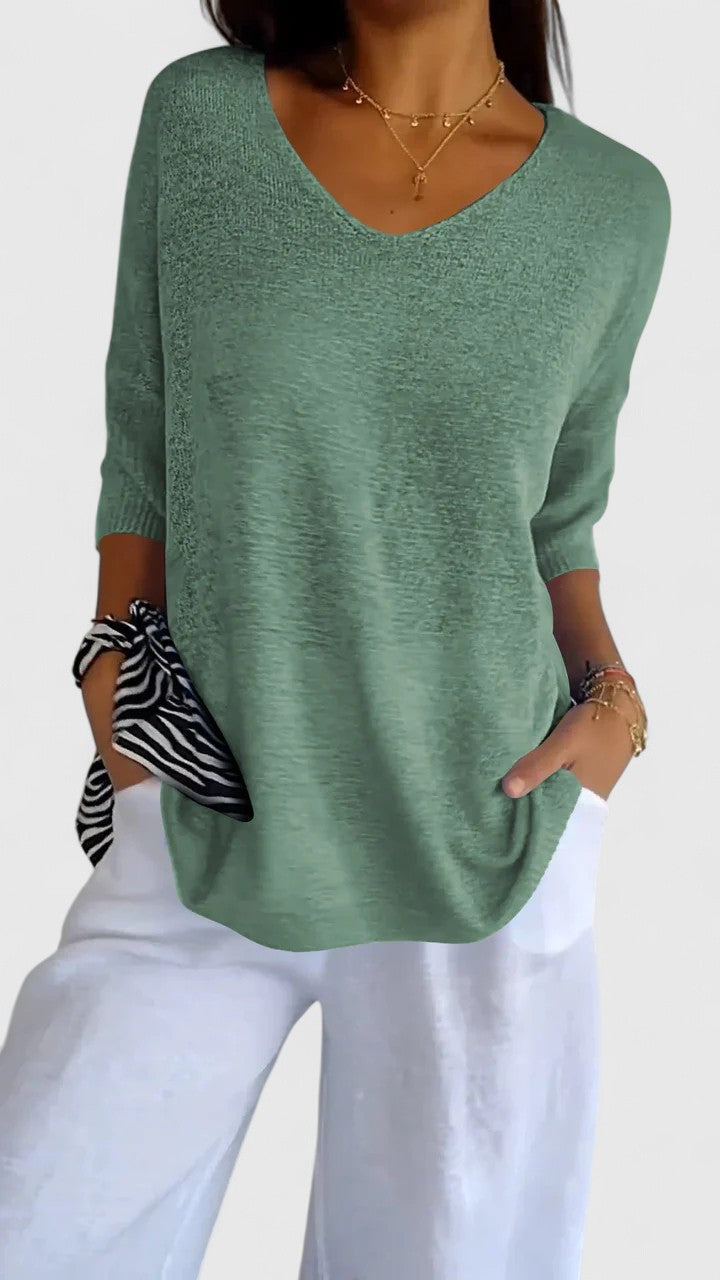 Women's textured V-neck sweater with three-quarter sleeves