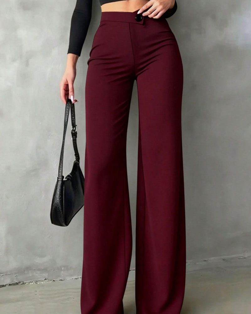 Women's high-waisted wide-leg suit pants with a button waist