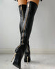 Black over the knee boots with gold-tone zippers and high stiletto heels
