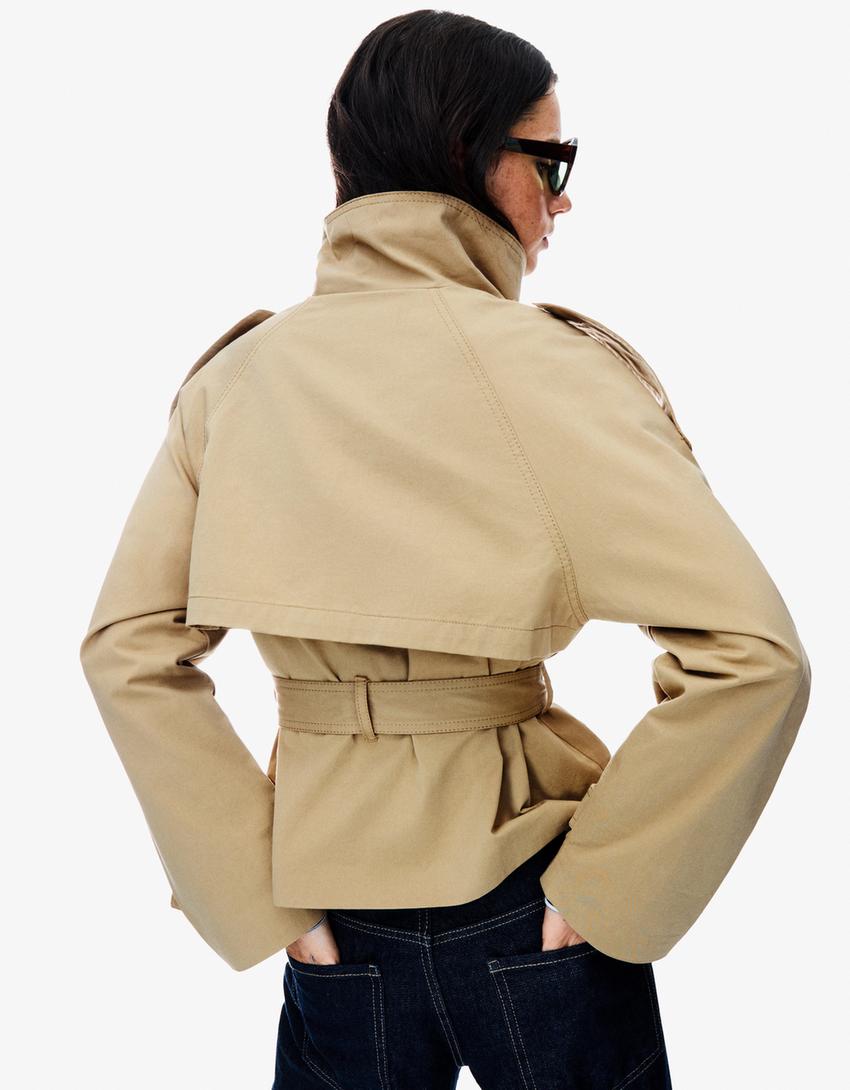 Women's trench jacket with high collar, button front, tie belt and long sleeves
