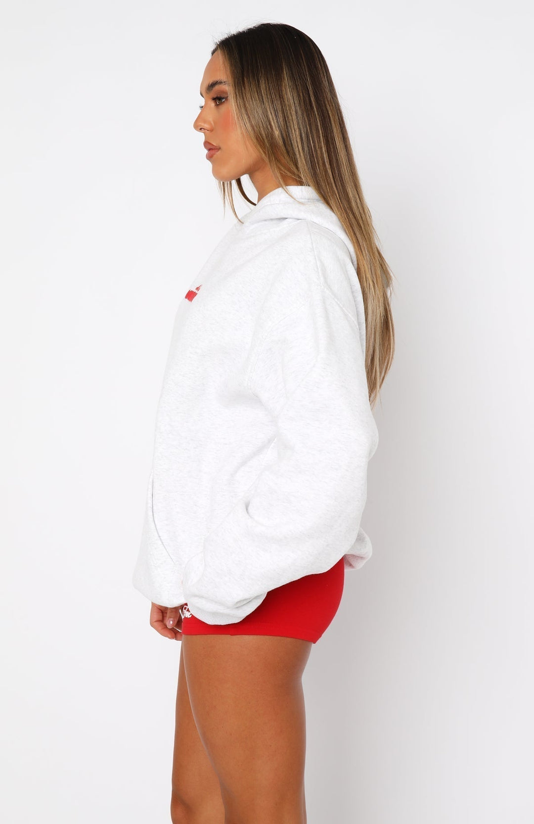 Women's oversized white hoodie with red White Fox graphic and hood