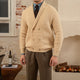 Men's textured knit cardigan with shawl collar and button front