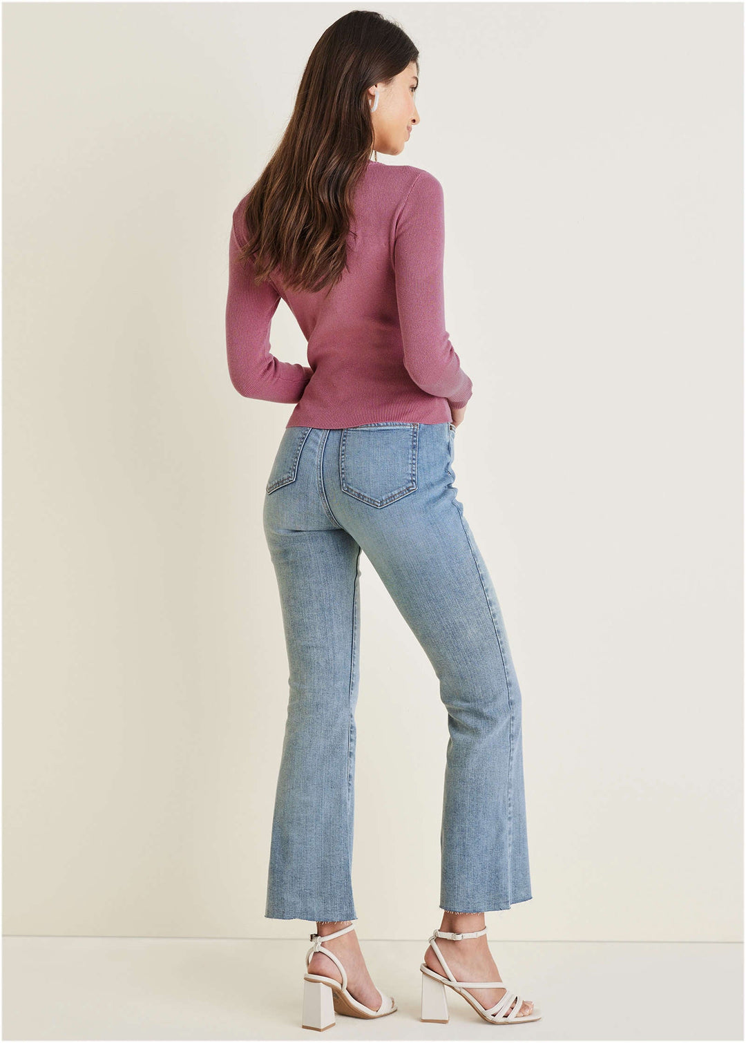 Women's pink ribbed wrap sweater with V-neck and side tie waist