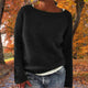 Women's relaxed plain knit sweater with round neckline and long sleeves