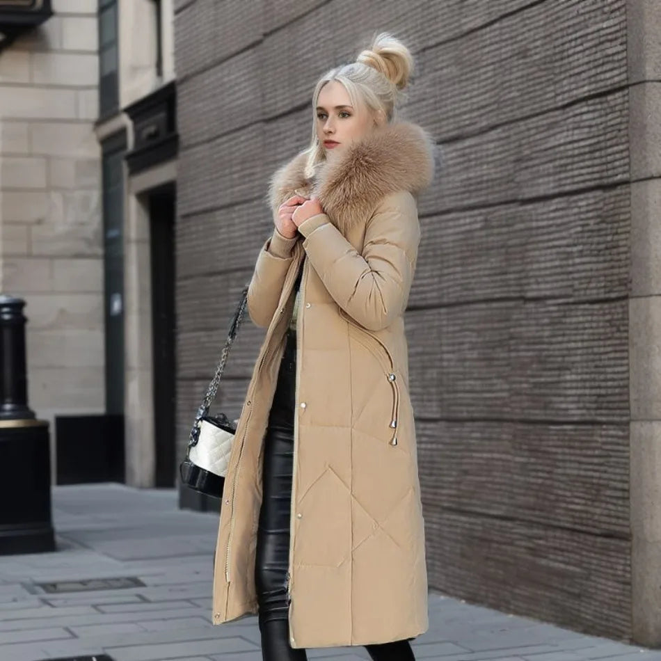 Women's long padded hooded coat with faux fur trim
