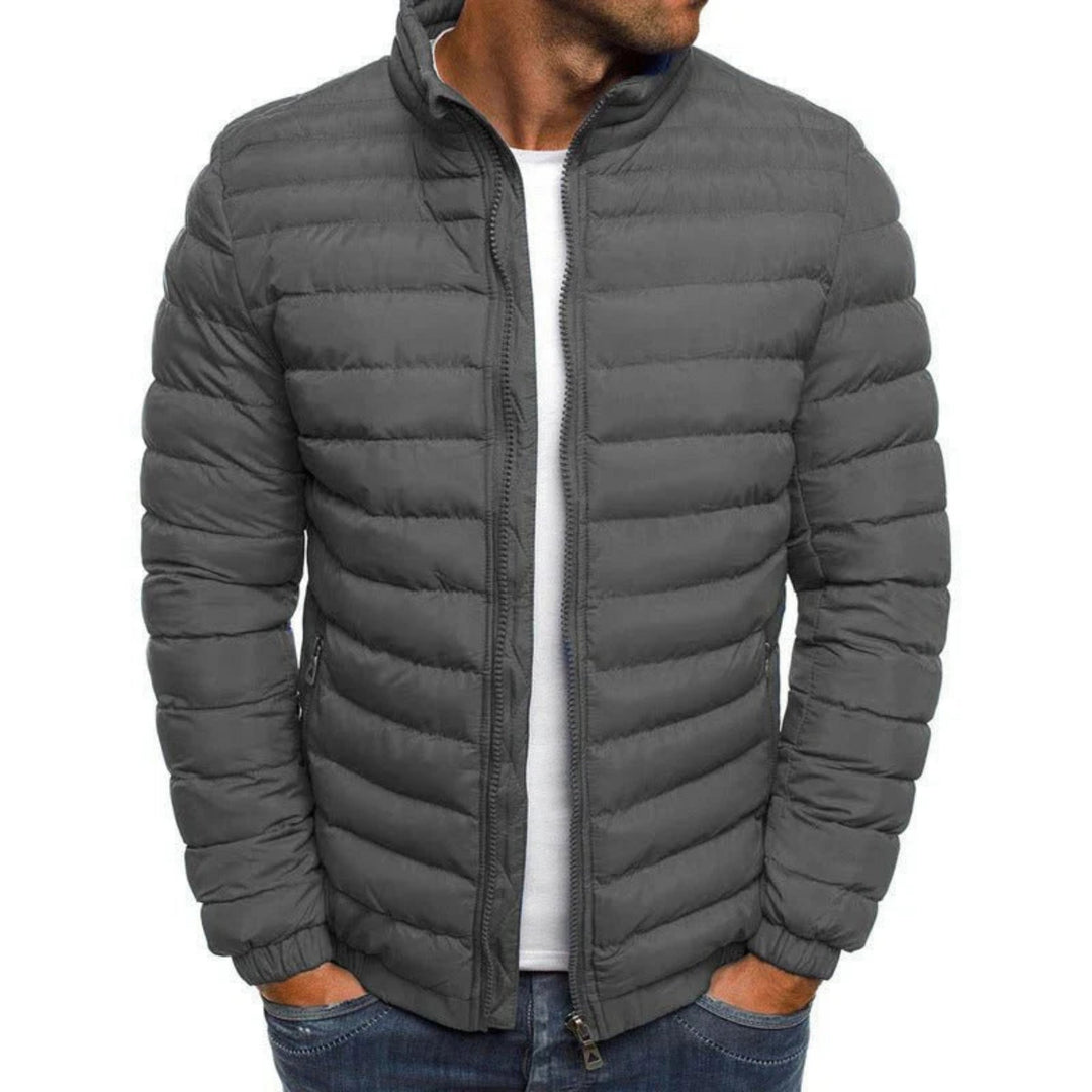 Men's quilted puffer jacket with high collar, long sleeves and zipped pockets