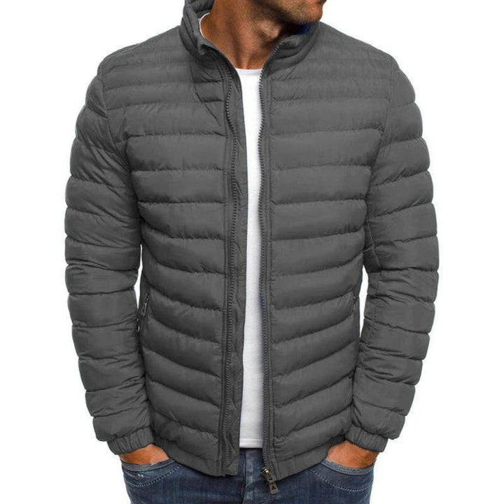 Men's quilted puffer jacket with high collar, long sleeves and zipped pockets