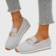 Women's loafer sneakers with metal bar detail and flat textured sole