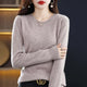 Women's crew neck knitted sweater with long sleeves and ribbed trims