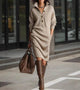 Women's knitted midi dress with high collar, buttons and long sleeves