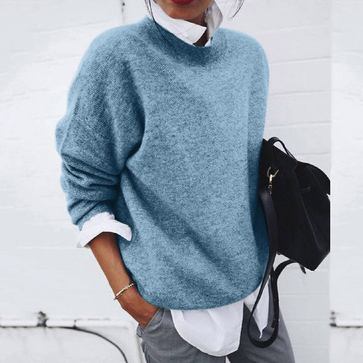 Women's knit cardigan with asymmetric button front and long sleeves