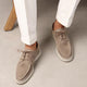 Men's lace-up moc toe loafers shown in navy and beige colourways