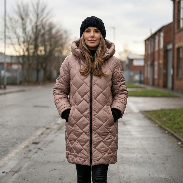 Women's quilted hooded long coat shown in pink and black