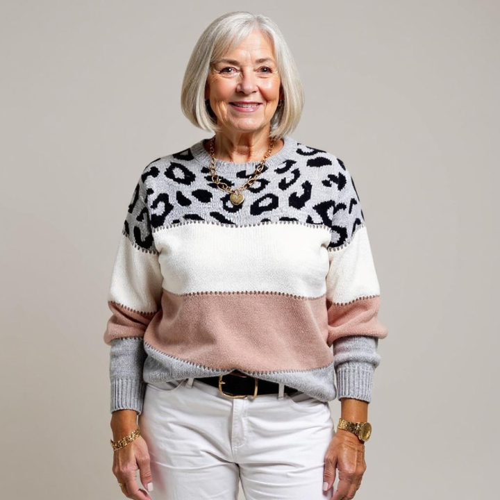 Women's leopard print color block sweater with crew neckline and long sleeves