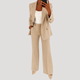 Women's tailored two-piece suit with notched-lapel blazer and straight-leg trousers