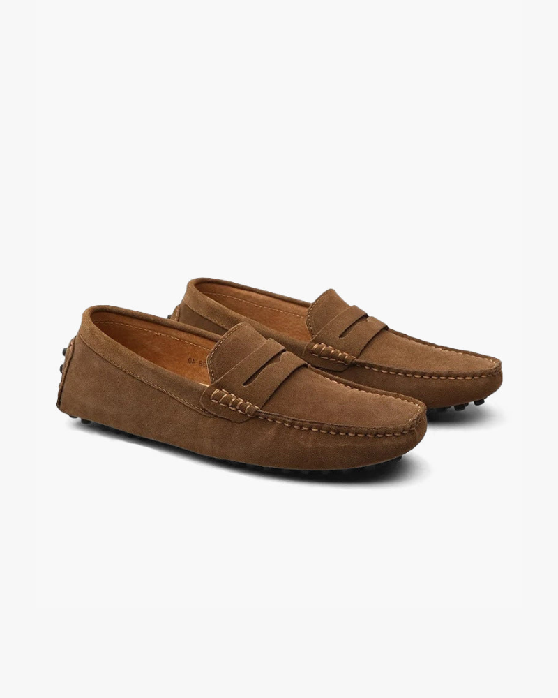 Men's penny loafers with rounded moc toes, vamp straps and stitched detailing