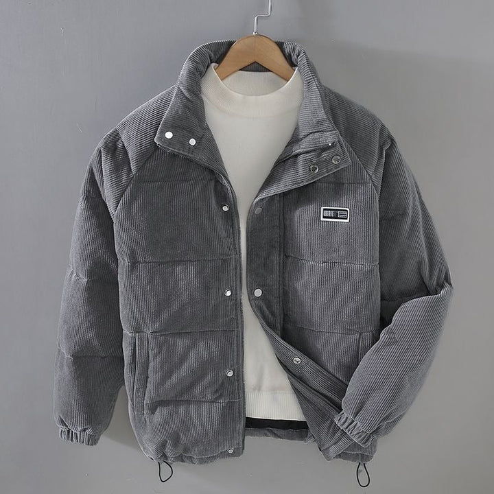 Corduroy puffer jacket with high collar, zip front and multiple pockets