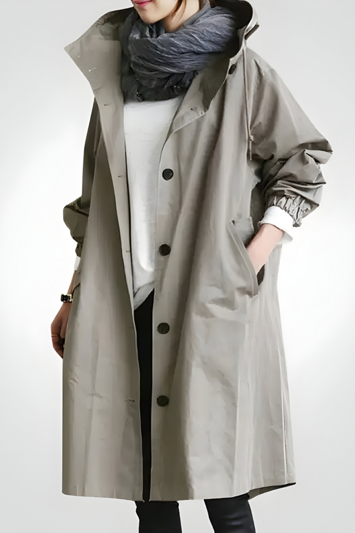 Women's longline hooded jacket with button front and gathered sleeves