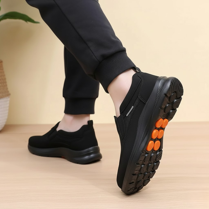 Unisex low-top slip-on sneakers with round toes and raised soles