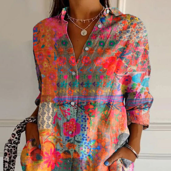 Woman wearing a bohemian floral print long-sleeve button-up blouse