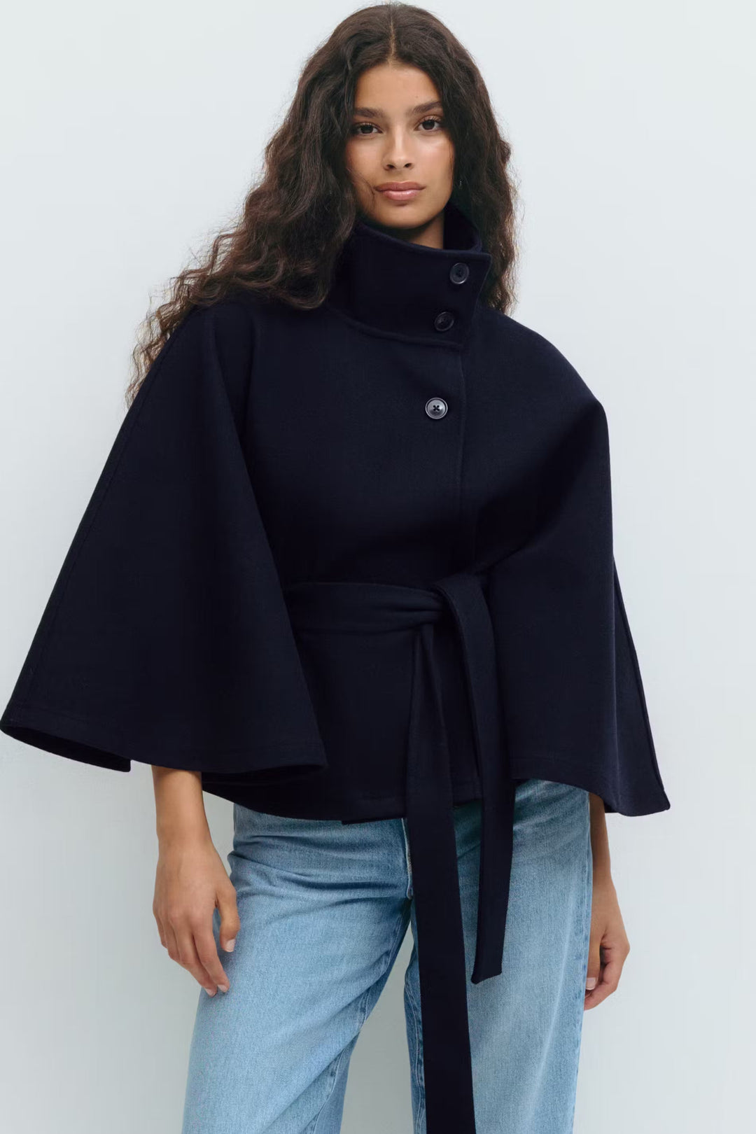 Women's belted cape coat with high collar and button front