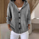 Women's hooded knit cardigan with long sleeves and button front