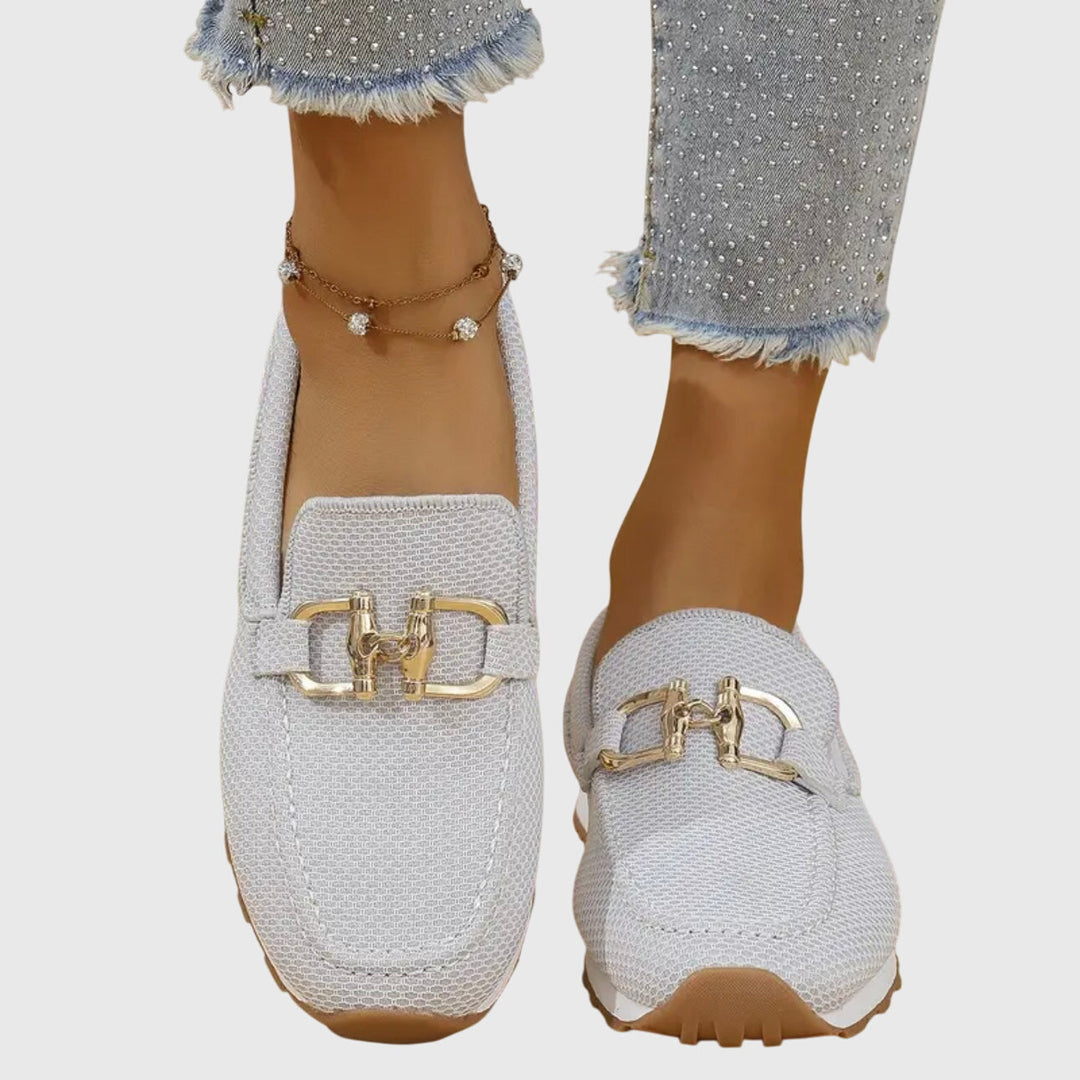 Women's loafer sneakers with metal bar detail and flat textured sole