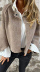 Women's textured hip-length coat with long sleeves and button front