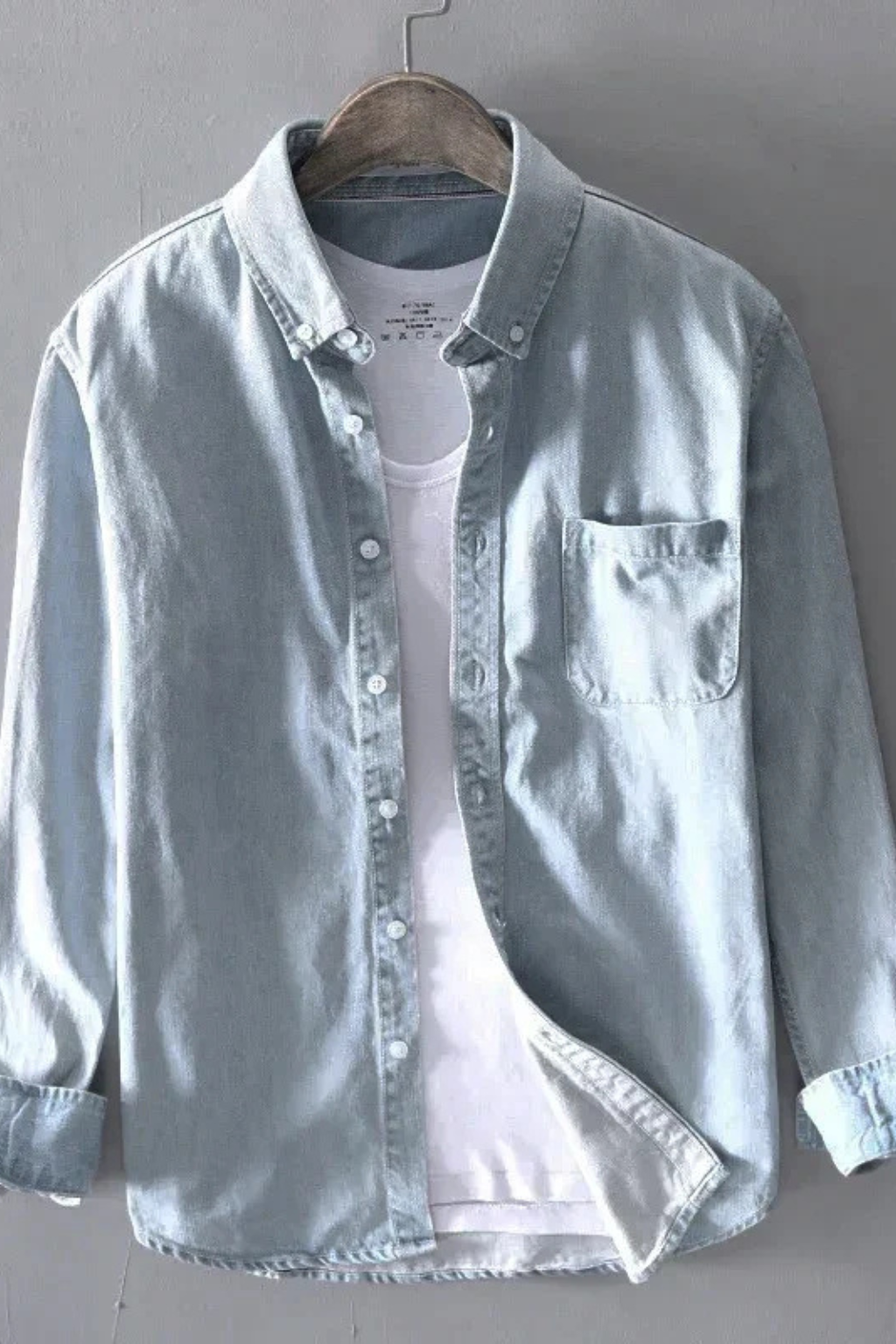 Men's button-down denim shirt with long sleeves and chest pocket