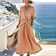 Women's wrap midi dress with V-neckline, short sleeves, and contrast trim in blue