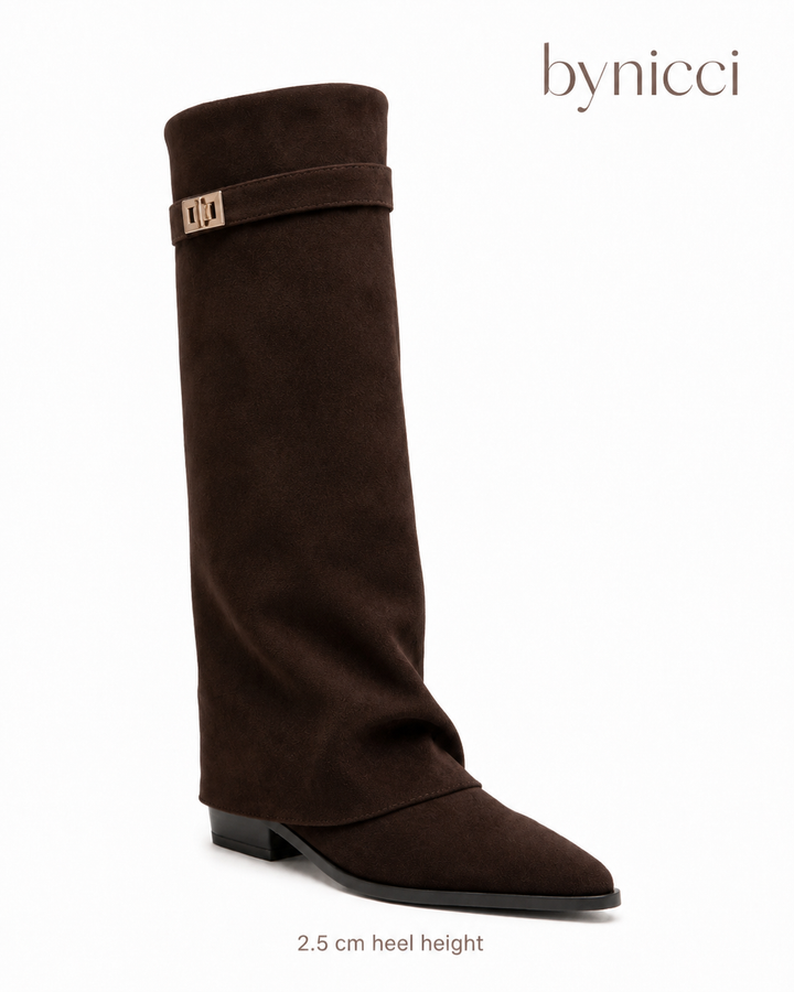 Women's brown knee-high boots with pointed toes, buckle straps and low block heels