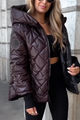 Women's quilted hooded puffer jacket with long sleeves and zip front