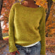 Women's relaxed plain knit sweater with round neckline and long sleeves