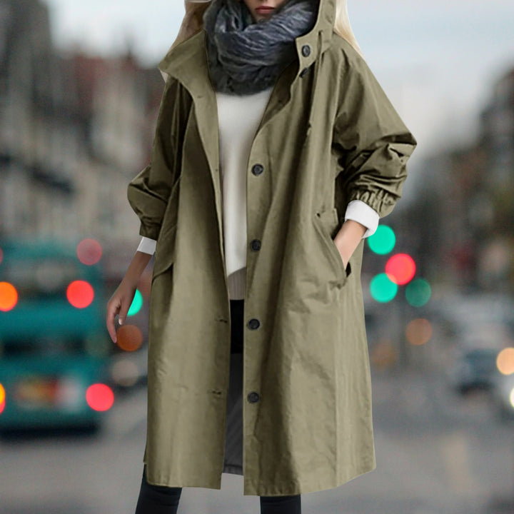 Women's hooded longline rain coat with button front and gathered cuffs