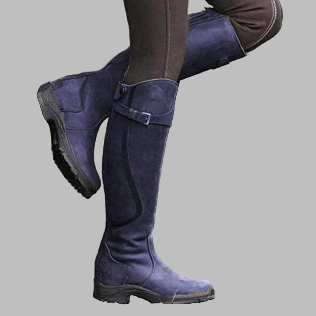 Women's tall riding boots with buckle strap and low heel