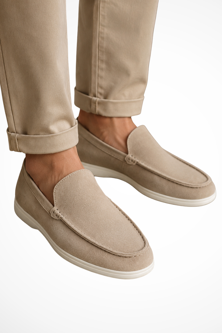 Men's slip-on loafers with rounded moc toe stitching and flat white soles