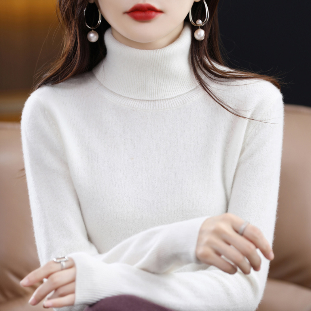 Women's solid knit turtleneck sweater with long sleeves