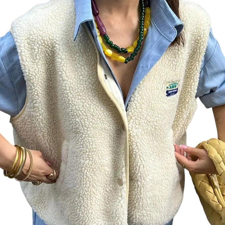 Women's sleeveless textured cardigan vest with V-neck, buttons and front pockets