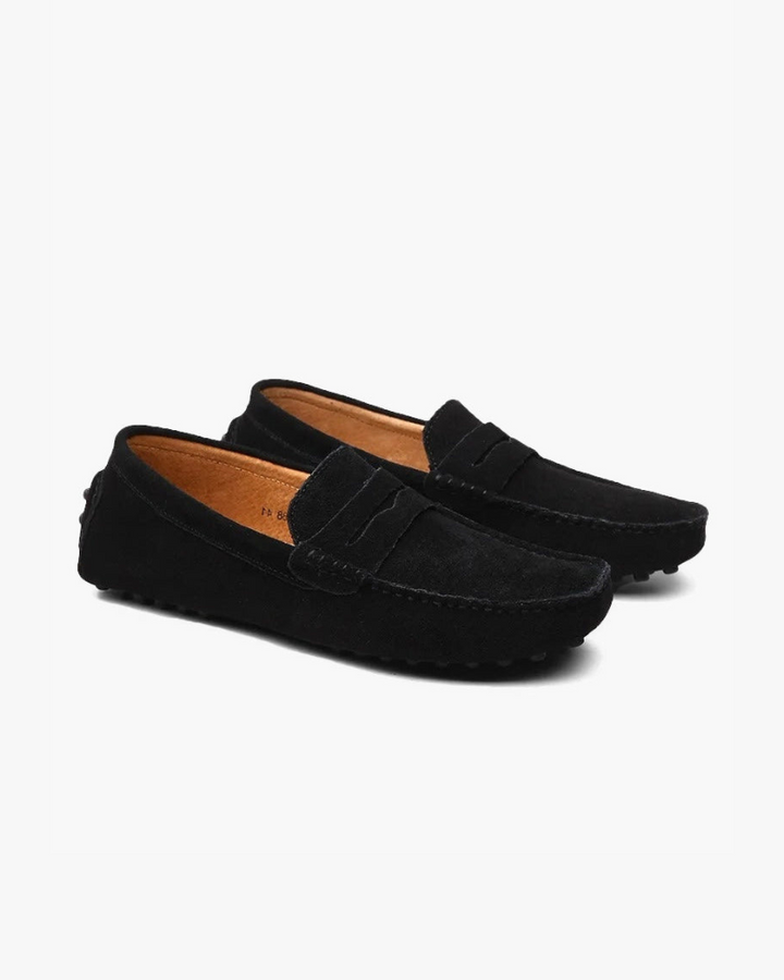 Men's penny loafers with rounded moc toes, vamp straps and stitched detailing