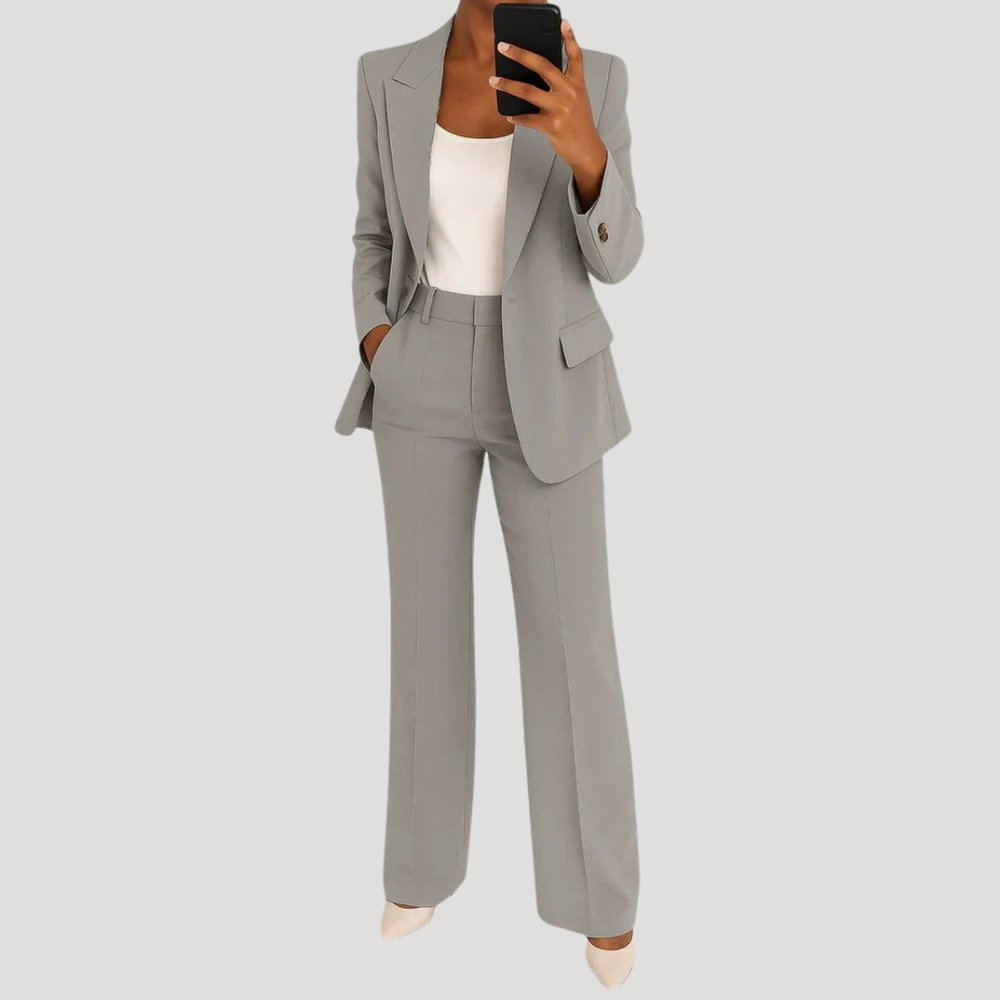 Women's tailored two-piece suit with notched-lapel blazer and straight-leg trousers