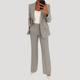 Women's tailored two-piece suit with notched-lapel blazer and straight-leg trousers